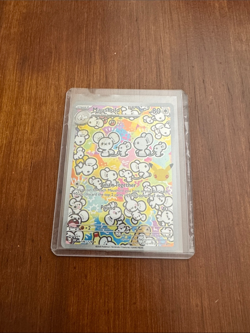 Moushold Pokémon card